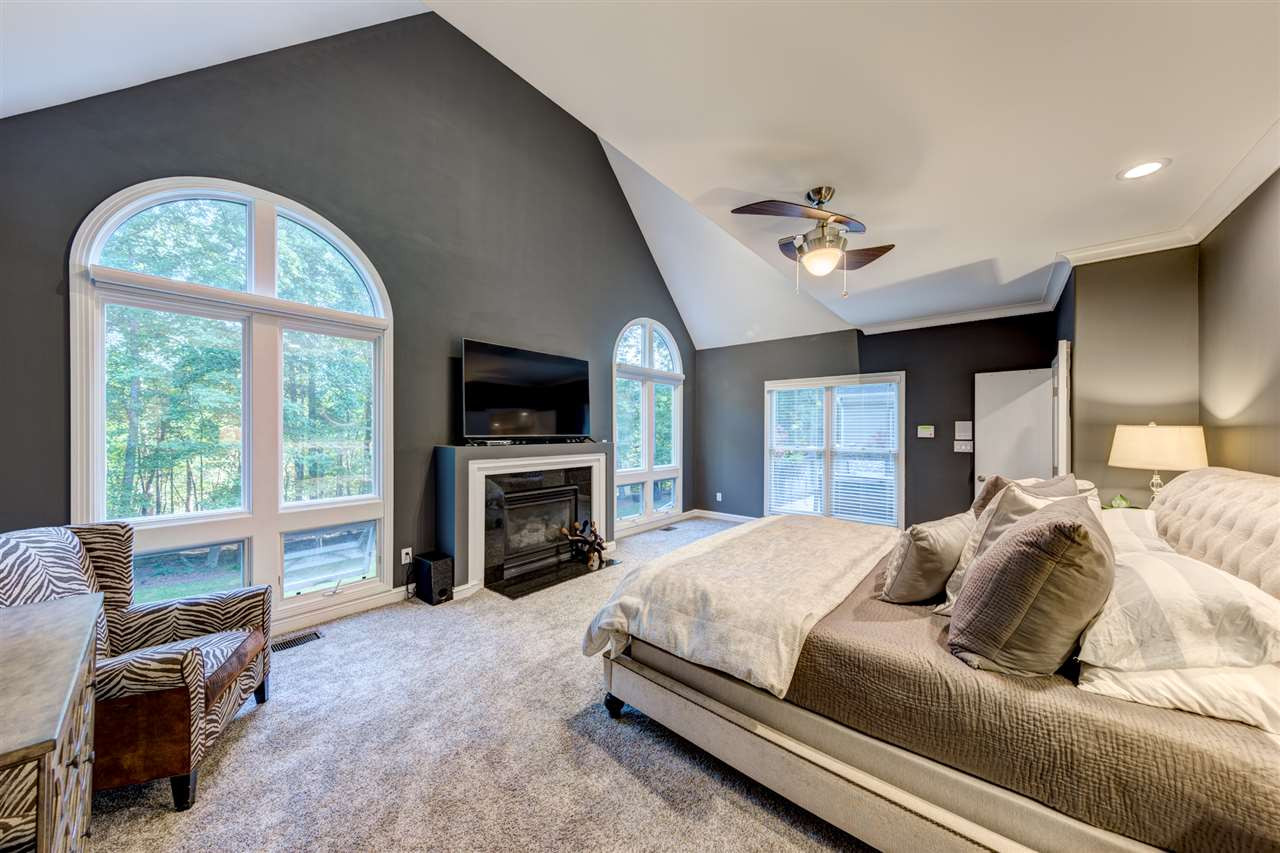 648 Pendleton Lake Road Raleigh, NC 27614 - Photo 11 of 30 The romantic first floor Master Bedroom Suite pulls you in after a long day. Retreat and relax! Vaulted Ceiling and Fireplace Master Bedroom Suite