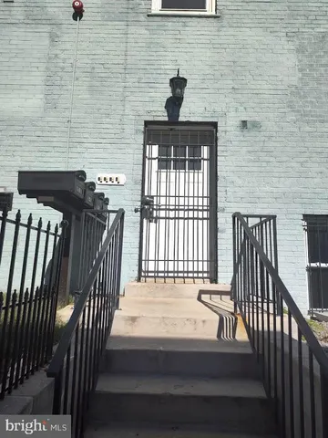 a view of a balcony with wooden floor