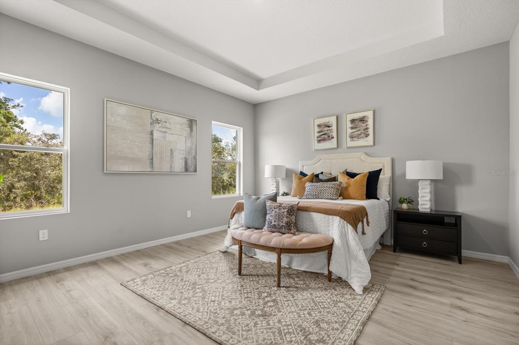 0 Marion Oaks Manor Ocala, FL 34473 - Photo 10 of 24 a bed room with a bed and a window