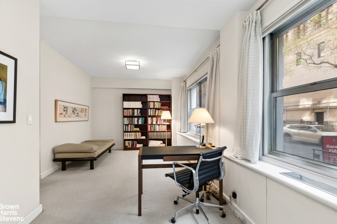 35 East 85th Street, Unit OF3S Manhattan, NY 10028 - Photo 3 of 9 a view of a workspace with furniture and a window