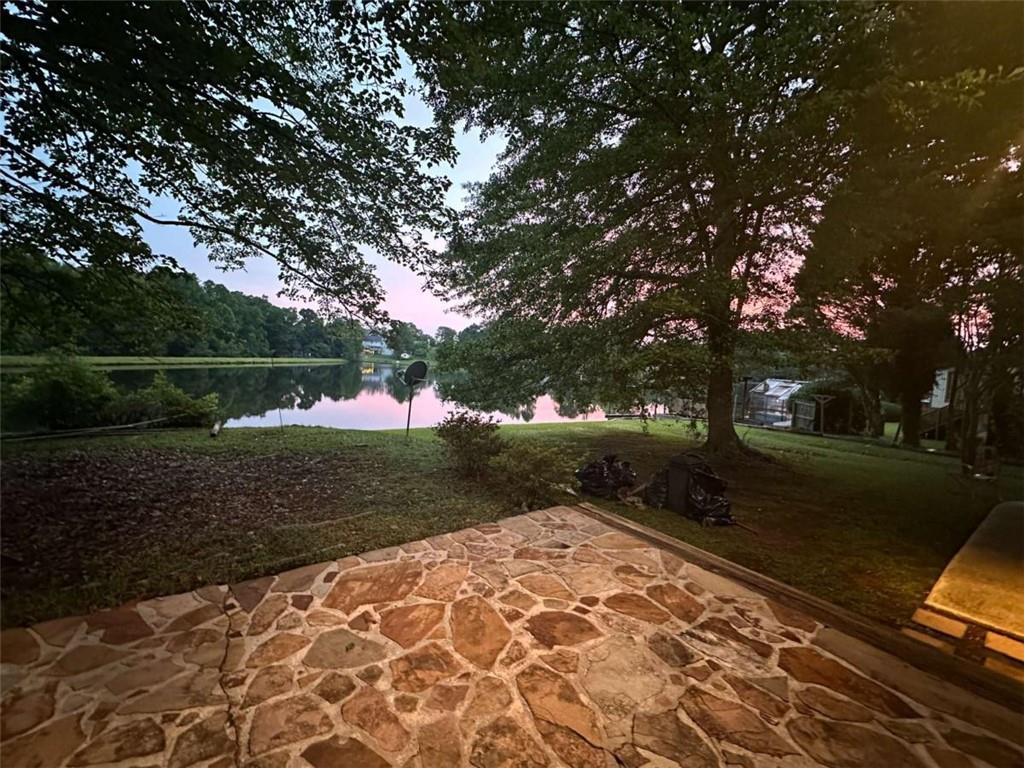 2145 Hampton Trail Southeast Conyers, GA 30013 - Photo 6 of 20 a backyard of a house with lots of green space