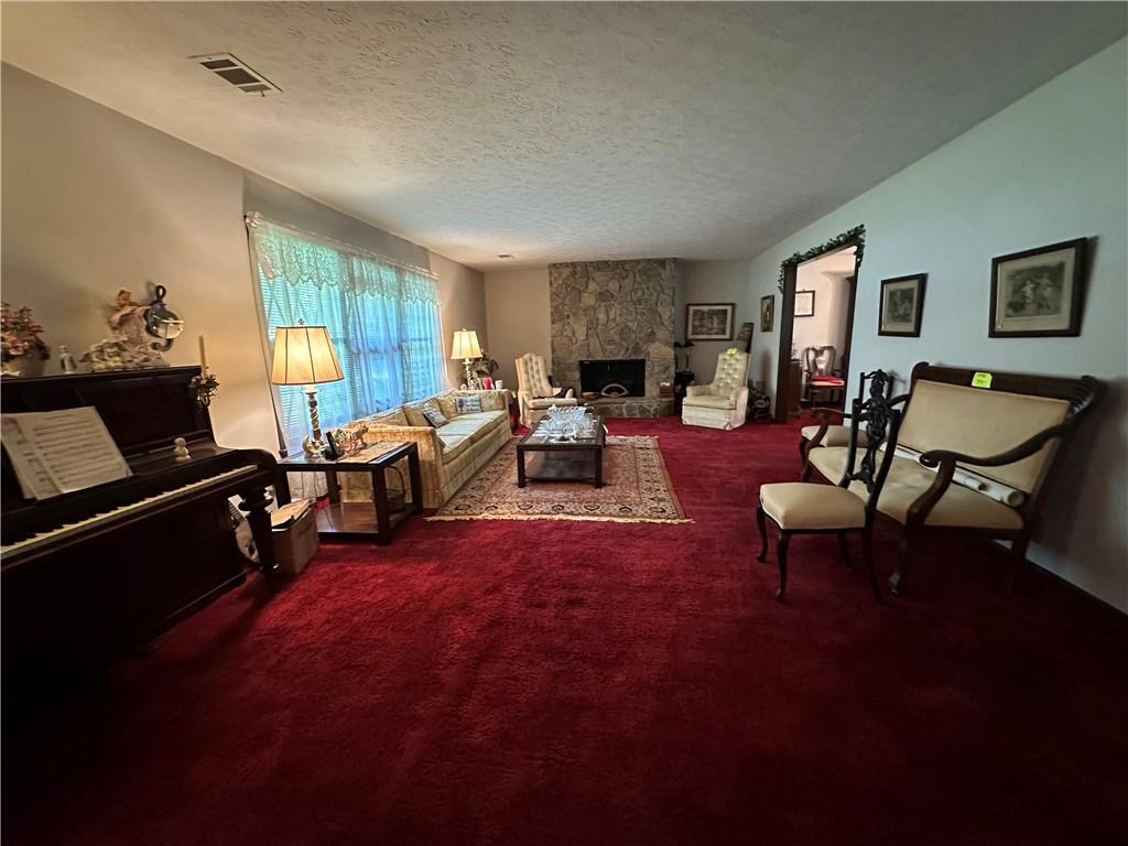 2145 Hampton Trail Southeast Conyers, GA 30013 - Photo 10 of 20 a living room with furniture and a window