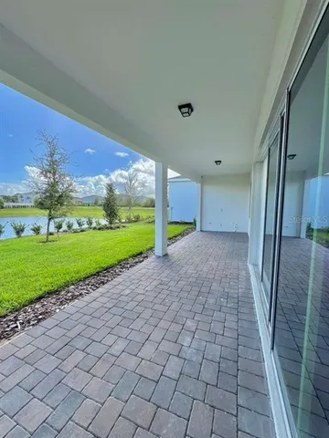 a view of a porch with a yard