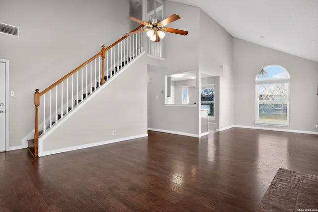 a view of an entryway with wooden floor
