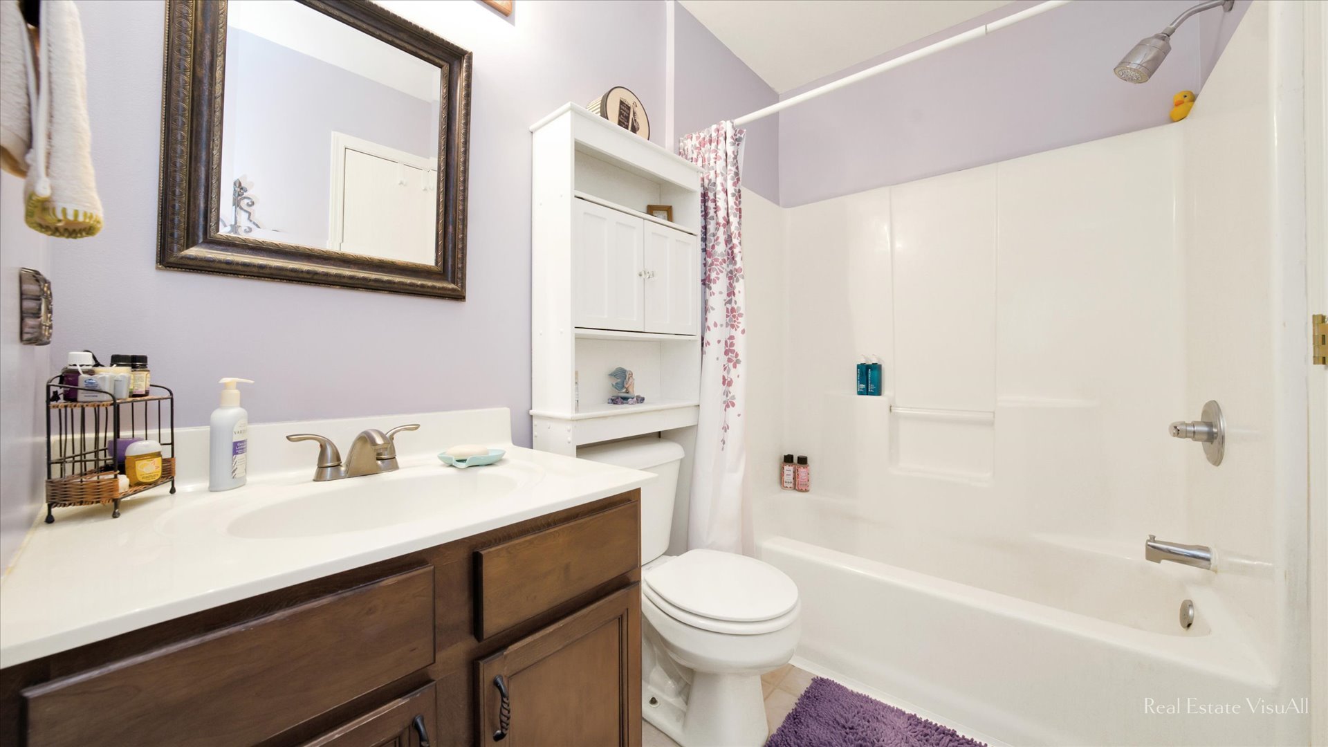 510 Timber Drive Harvard, IL 60033 - Photo 11 of 18 a bathroom with a sink a toilet a mirror a vanity and shower