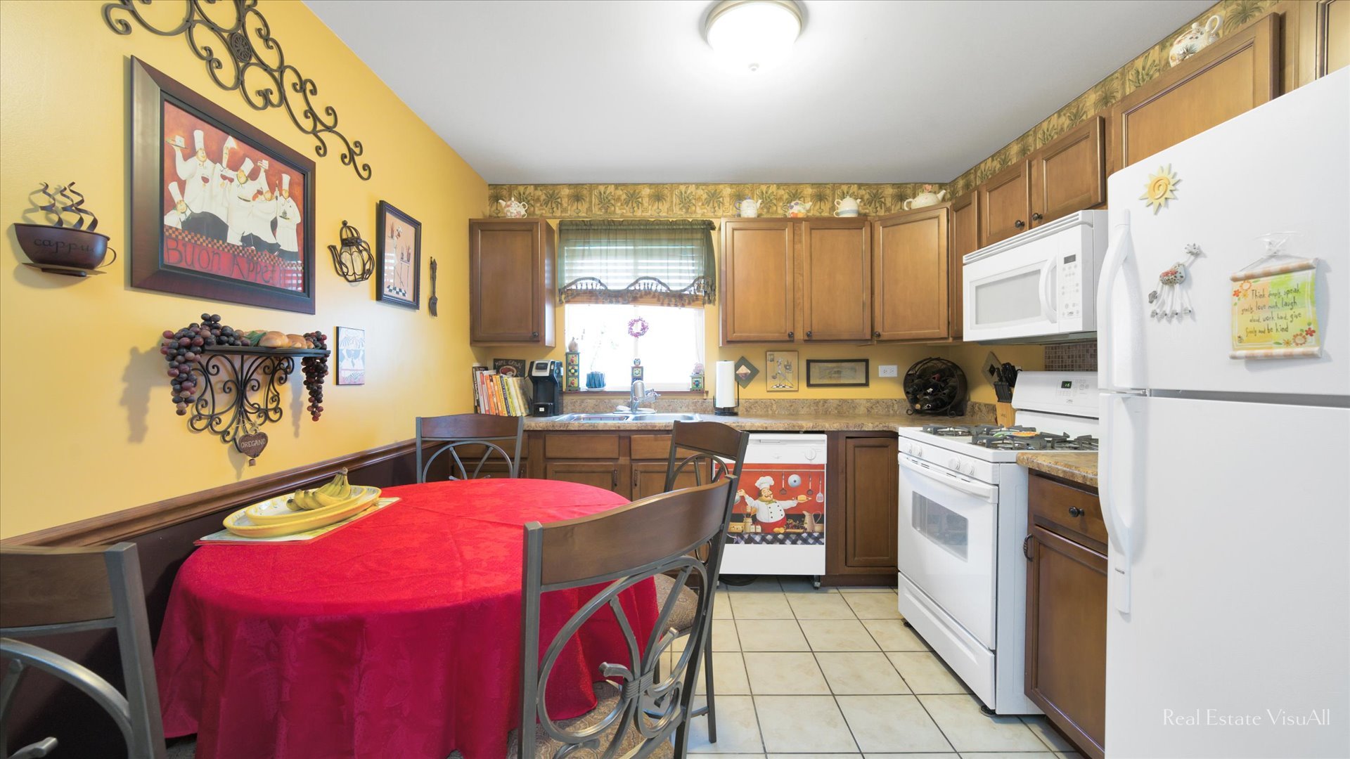 510 Timber Drive Harvard, IL 60033 - Photo 7 of 18 a kitchen with stainless steel appliances kitchen island granite countertop a dining table chairs sink and cabinets