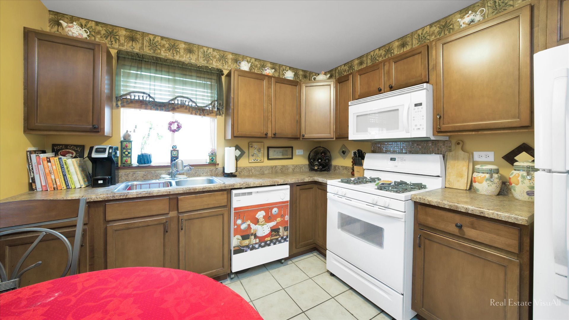 510 Timber Drive Harvard, IL 60033 - Photo 8 of 18 a kitchen with a sink stove and cabinets