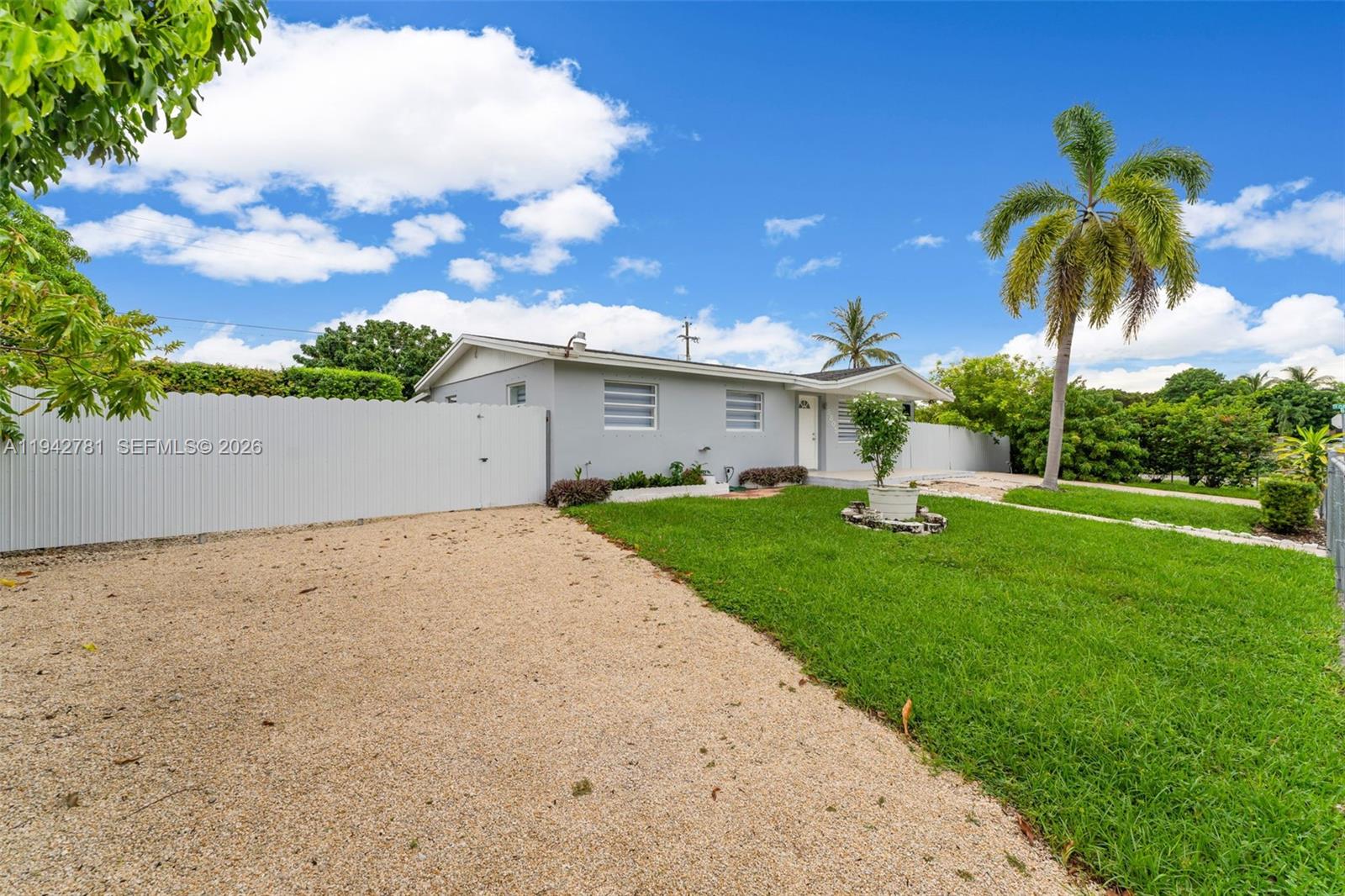 15805 Southwest 300th Terrace Homestead, FL 33033 - Photo 11 of 52 a view of a house with a yard