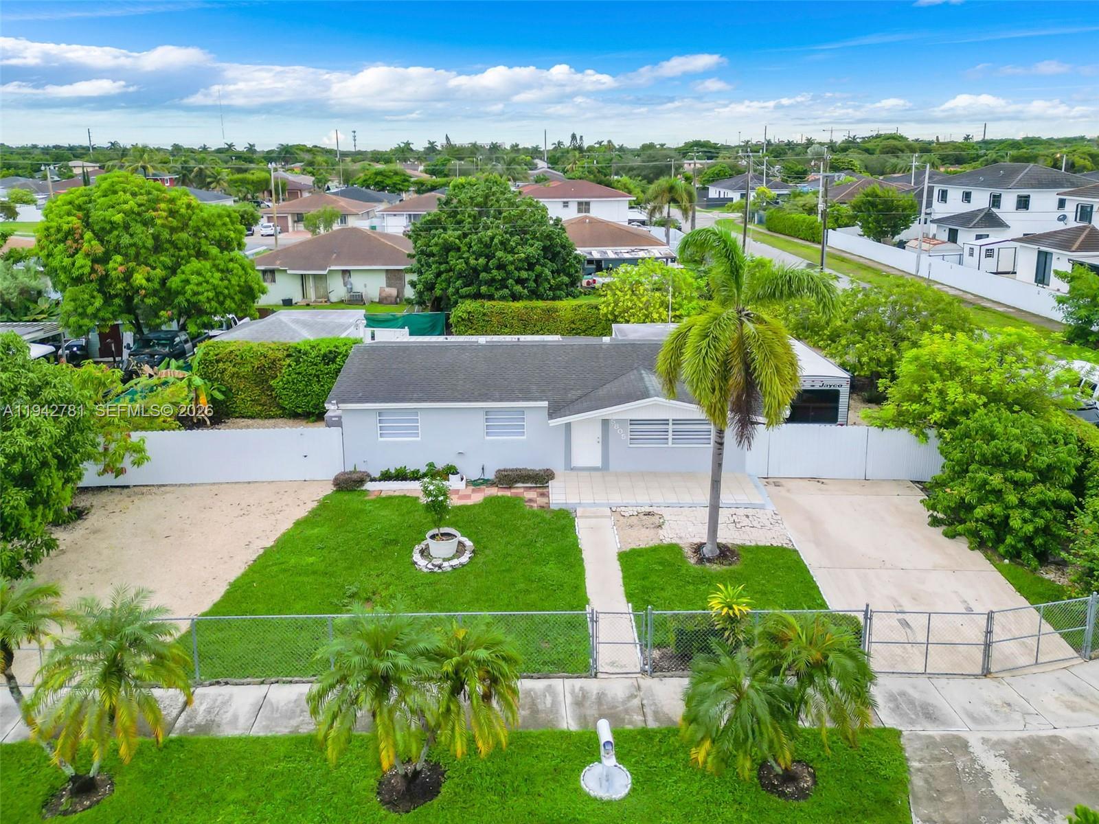15805 Southwest 300th Terrace Homestead, FL 33033 - Photo 2 of 52 an aerial view of a house