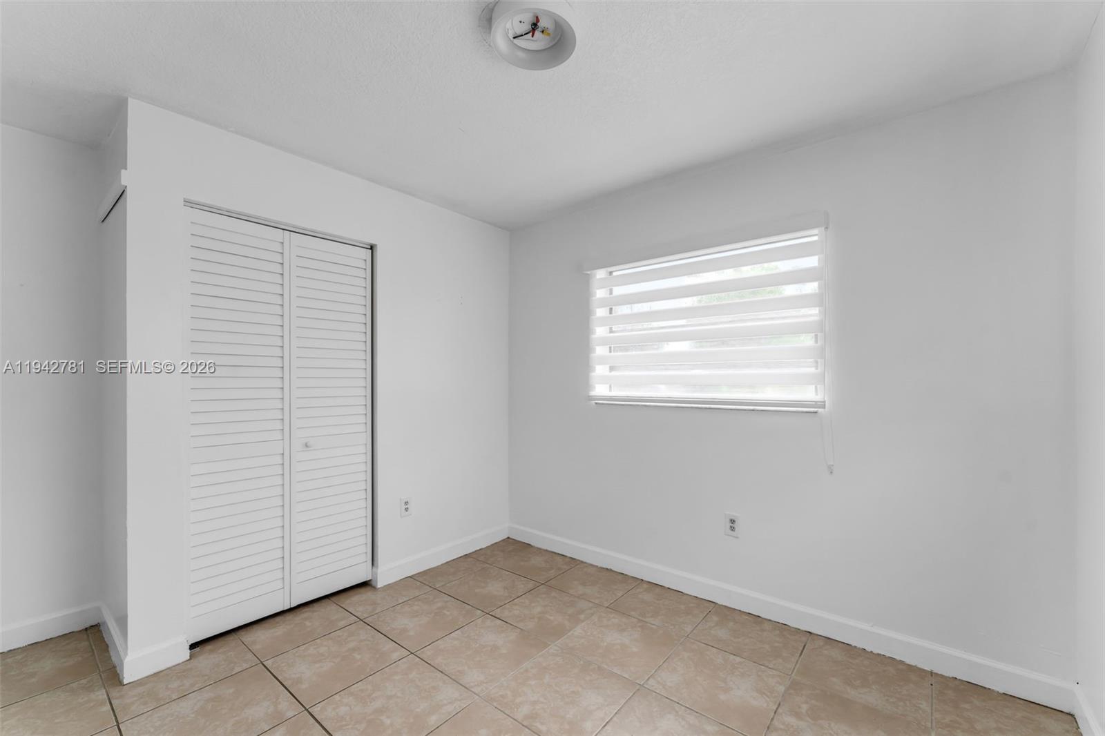 15805 Southwest 300th Terrace Homestead, FL 33033 - Photo 24 of 52 an empty room with windows