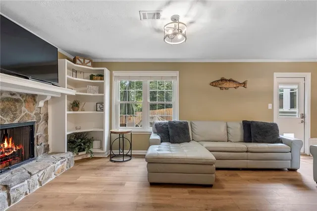 a bed room with a bed and a television