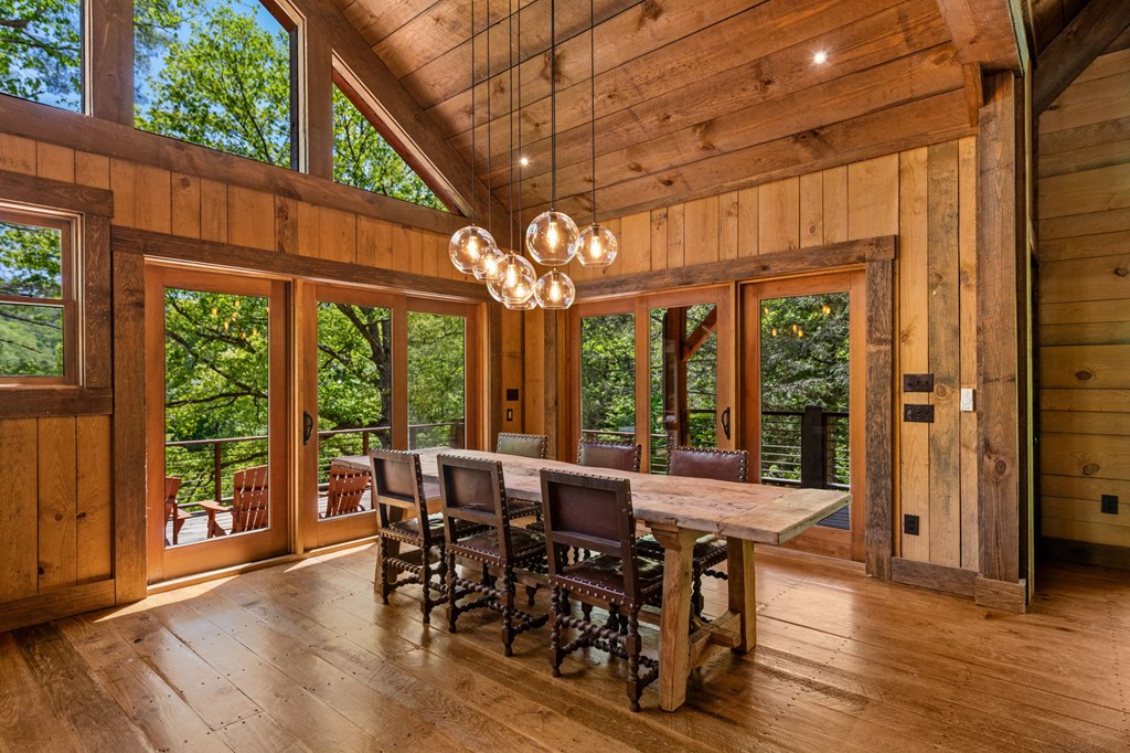 2100 Big Creek Road Cherry Log, GA 30522 - Photo 6 of 148 a view of a dining room with furniture window and wooden floor
