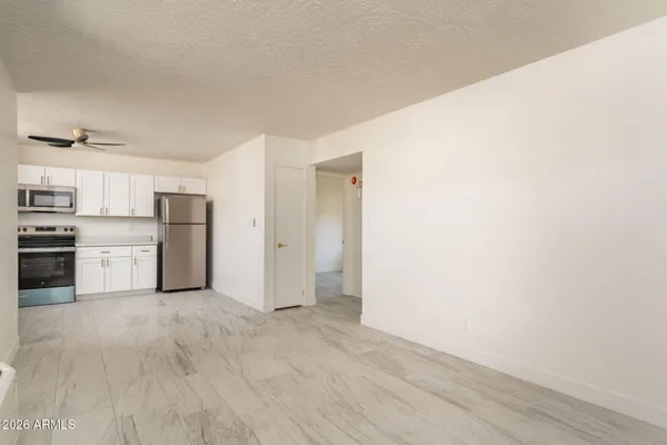a view of kitchen with wooden floor