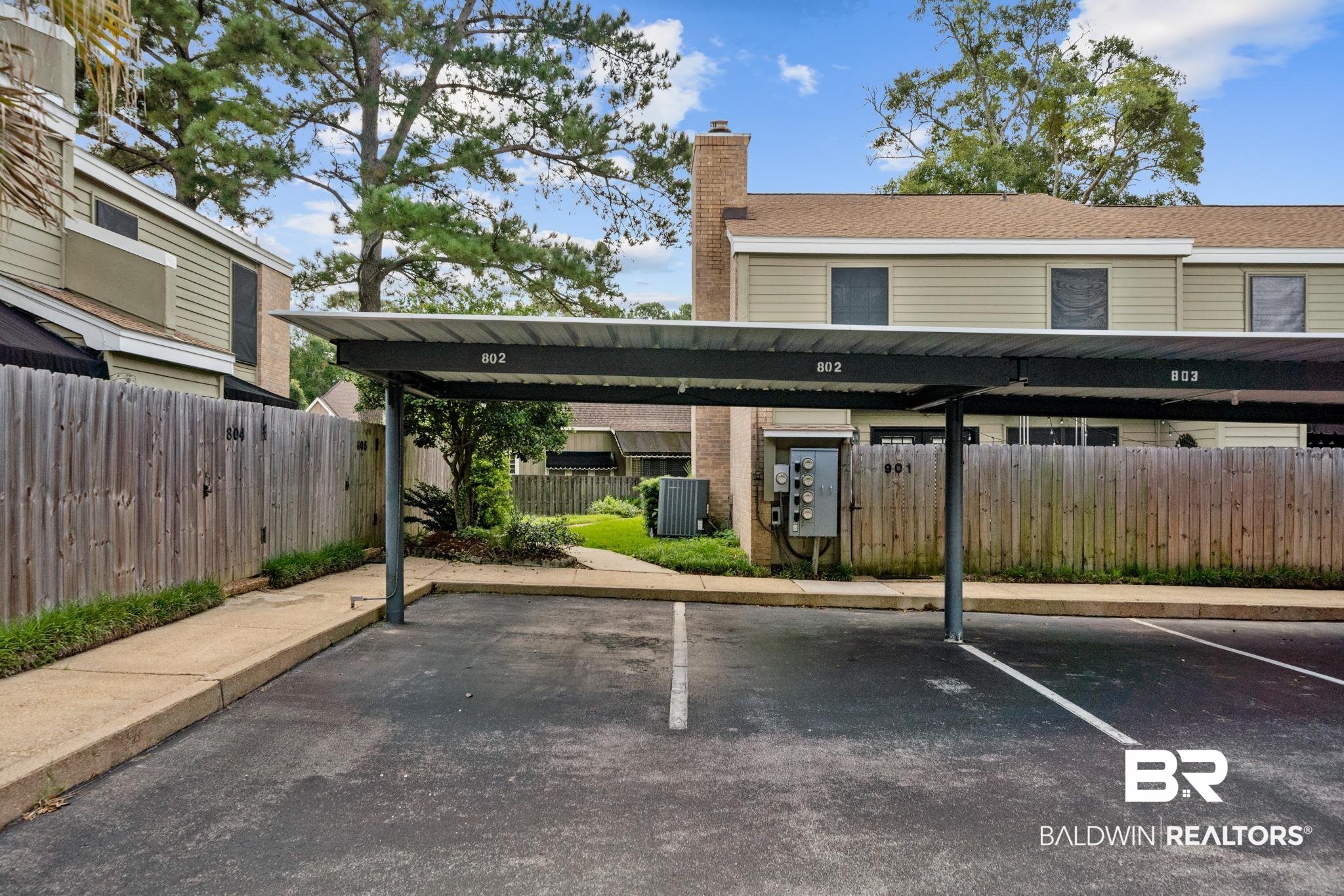 2901 Grant Street, Unit 802 Mobile, AL 36606 - Photo 33 of 37 View of car parking featuring a carport
