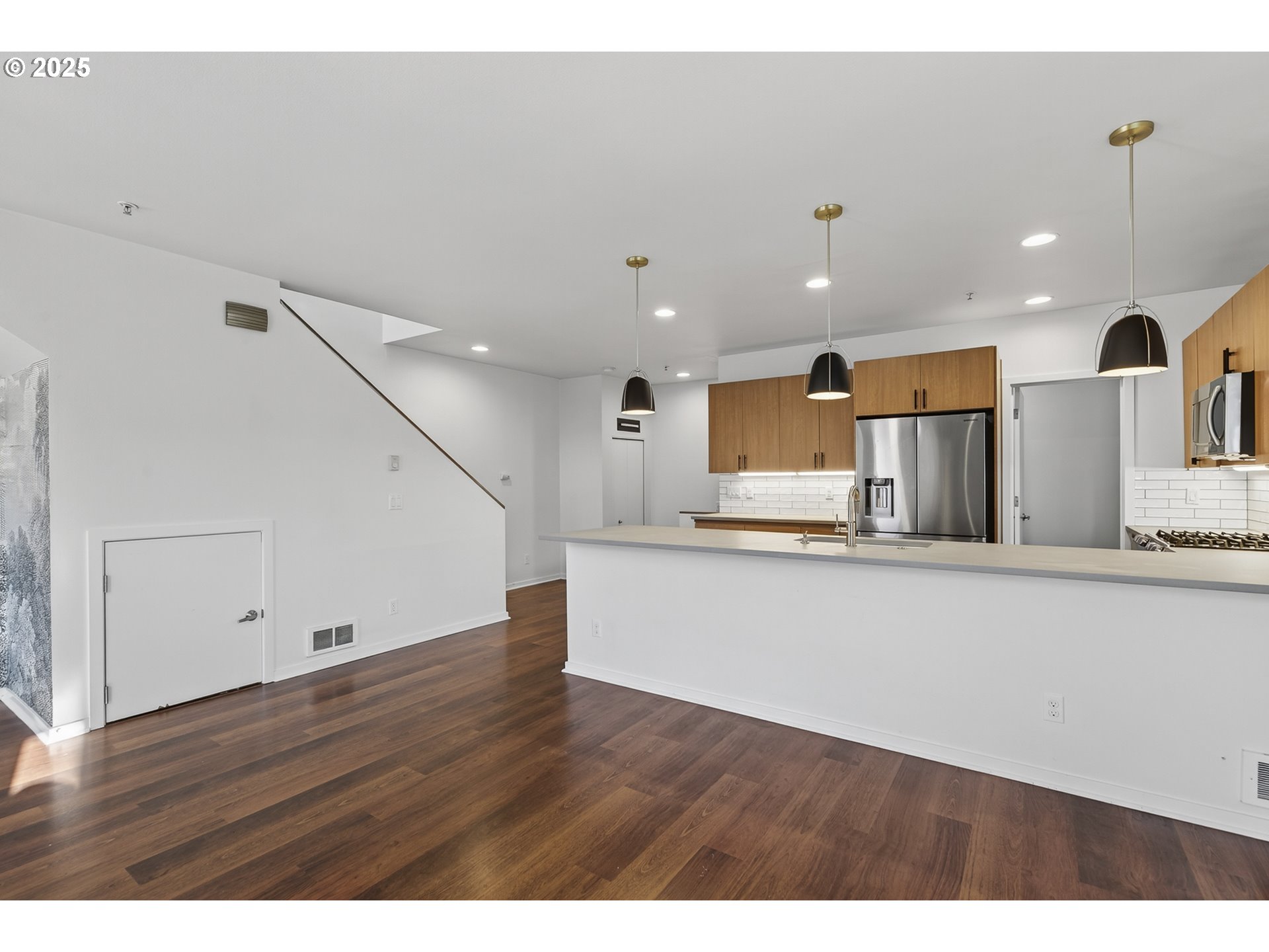 8083 North Leavitt Avenue Portland, OR 97203 - Photo 17 of 34 a view of kitchen with cabinets and wooden floor