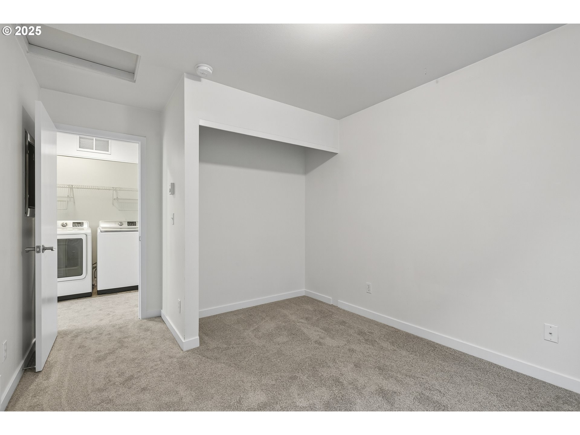 8083 North Leavitt Avenue Portland, OR 97203 - Photo 28 of 34 a view of a hallway with wooden floor