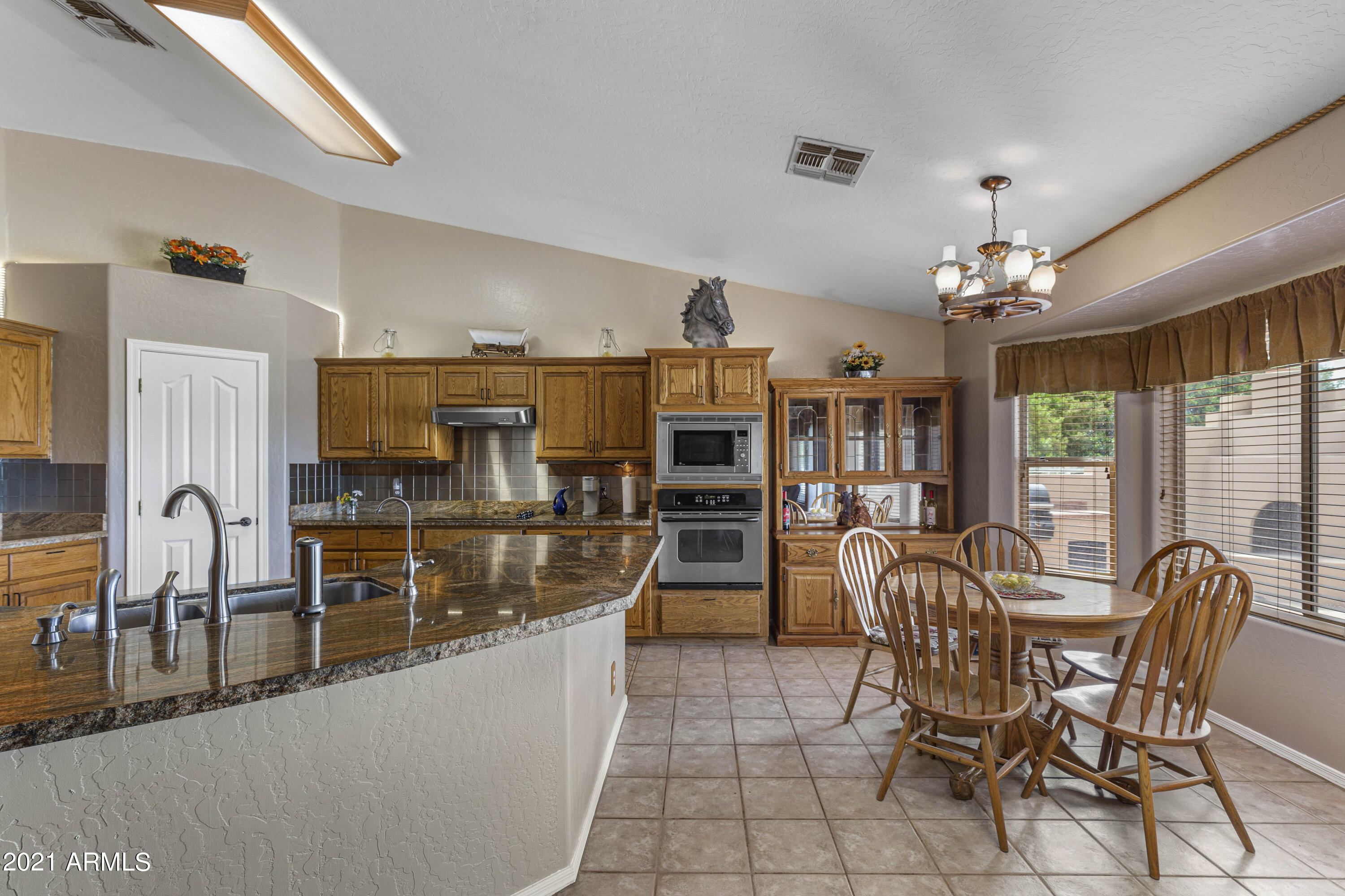 15431 East Via Del Rancho Gilbert, AZ 85298 - Photo 16 of 46 Kitchen and Dining Room