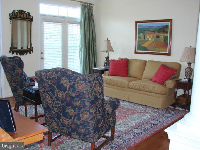 2205 Bear Den Road Frederick, MD 21701 - Photo 13 of 19 a living room with furniture a couch and large window