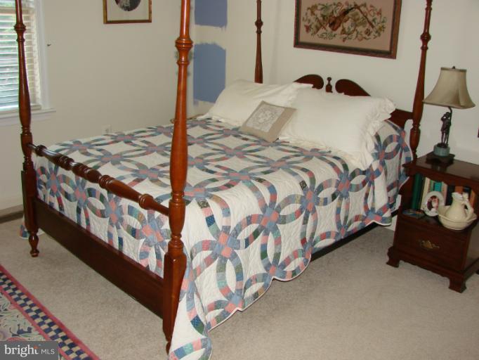2205 Bear Den Road Frederick, MD 21701 - Photo 3 of 19 a bedroom with a bed and a window