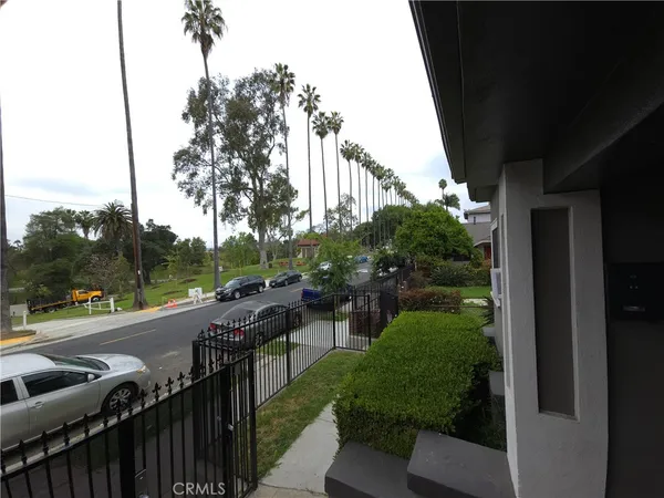 a view of a street with sitting area