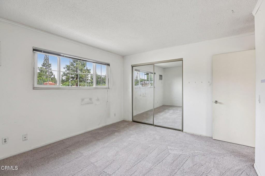 10856 Topeka Drive Porter Ranch, CA 91326 - Photo 27 of 39 an empty room with windows