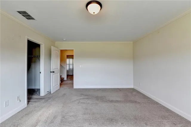 a bathroom with a granite countertop sink mirror and a bathtub