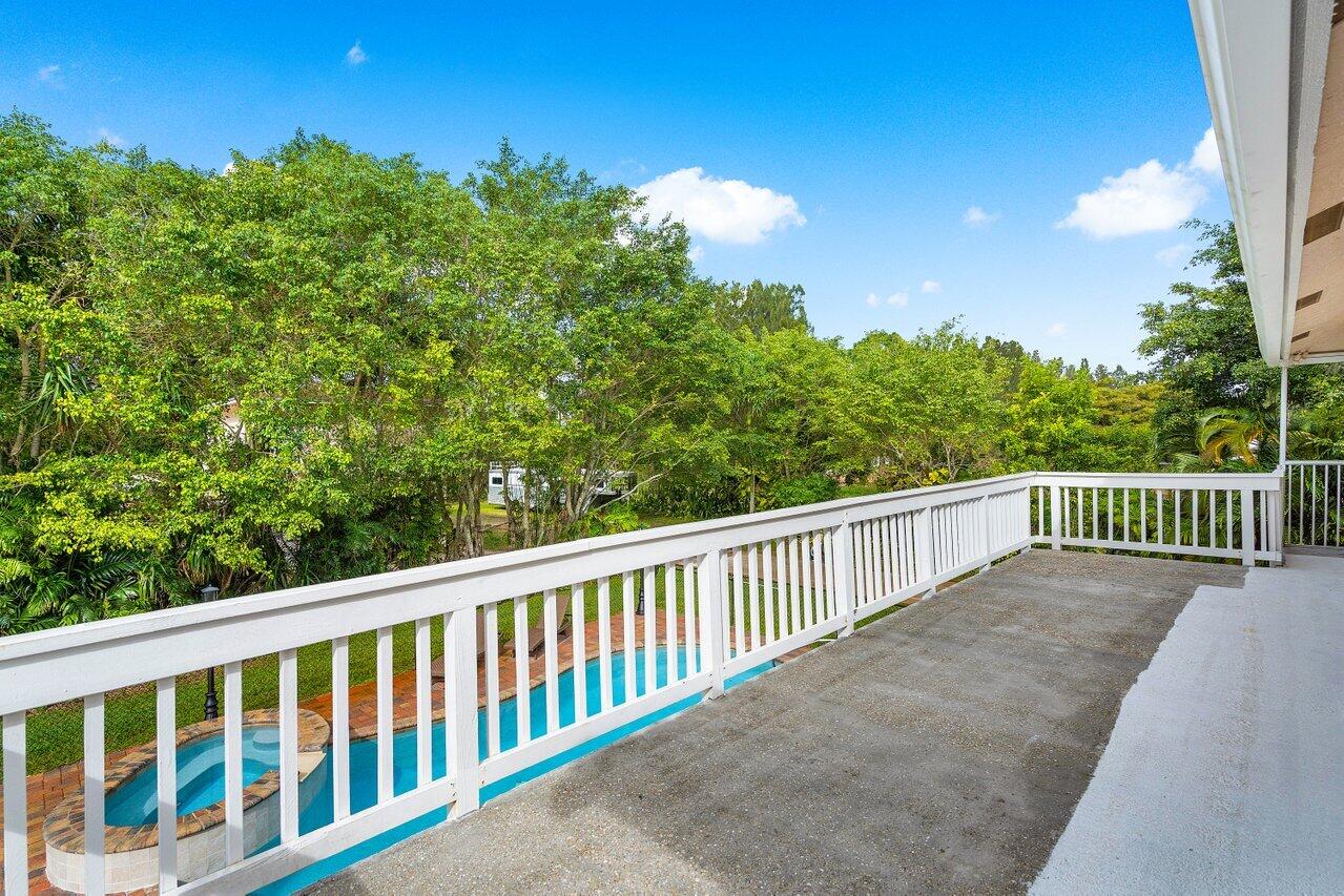 5515 Colbright Road Lake Worth, FL 33467 - Photo 32 of 58 balcony off guest room and primary room