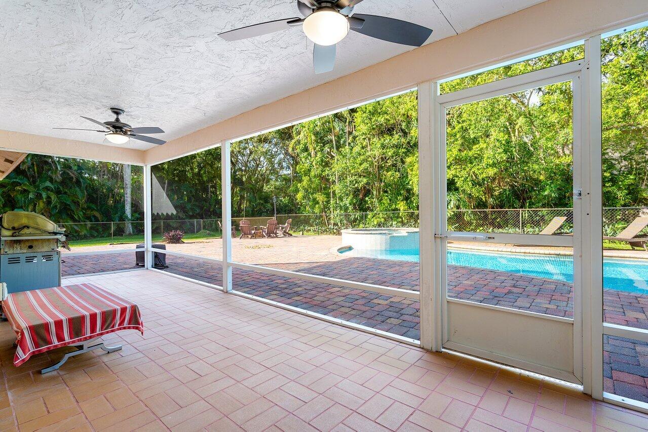 5515 Colbright Road Lake Worth, FL 33467 - Photo 33 of 58 Screened in covered patio