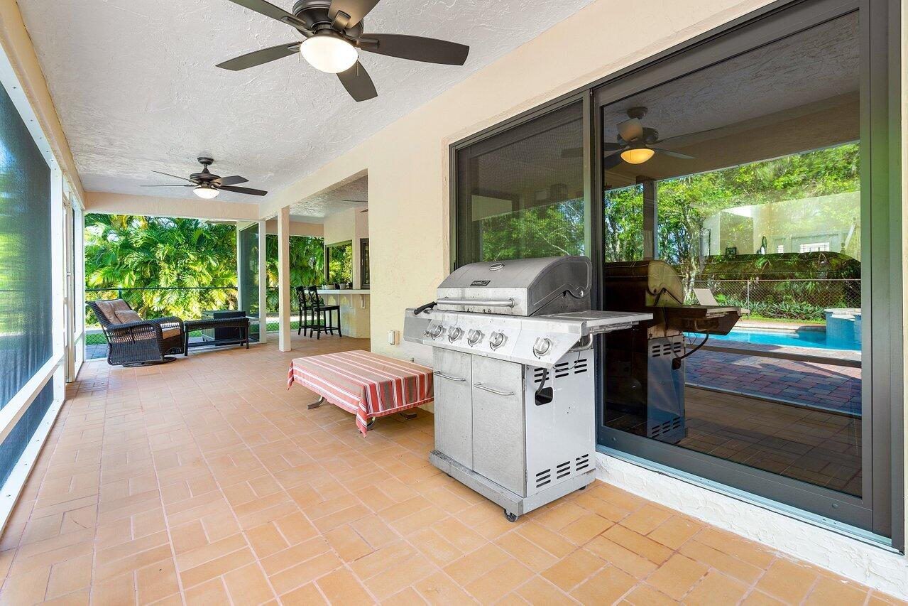 5515 Colbright Road Lake Worth, FL 33467 - Photo 34 of 58 Screened in covered patio
