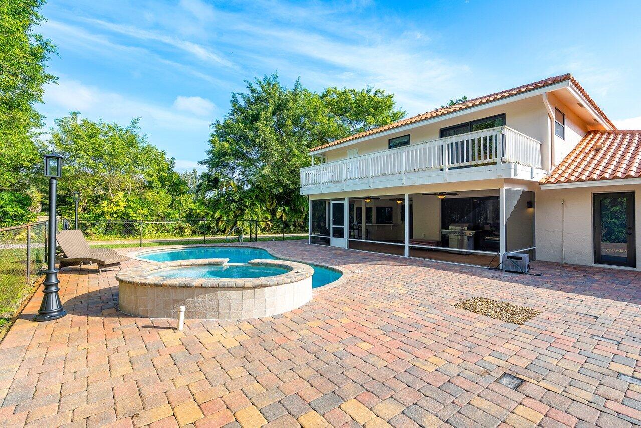 5515 Colbright Road Lake Worth, FL 33467 - Photo 39 of 58 spa and back of the home