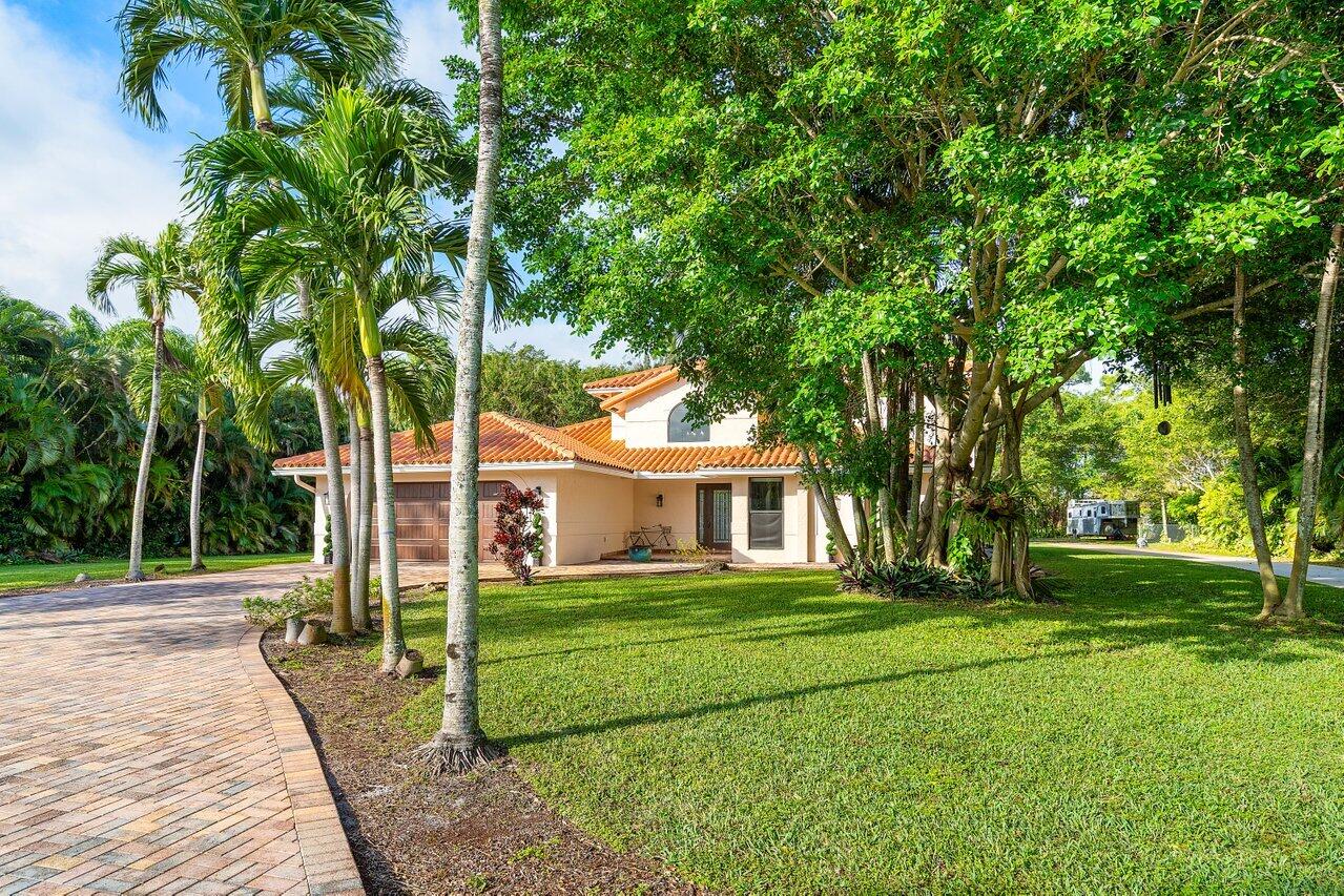 5515 Colbright Road Lake Worth, FL 33467 - Photo 4 of 58 Front of home