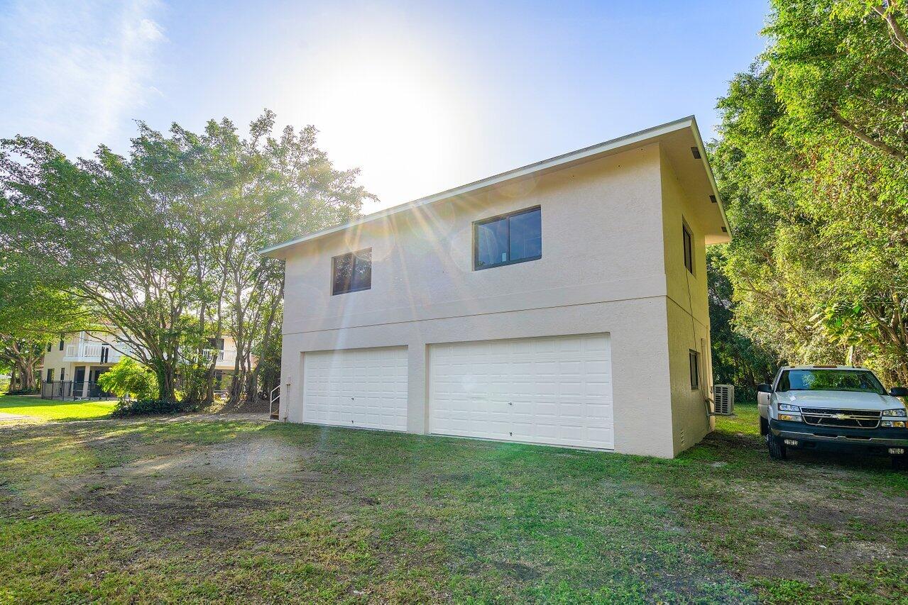 5515 Colbright Road Lake Worth, FL 33467 - Photo 48 of 58 4 car garage with unfinished apartment