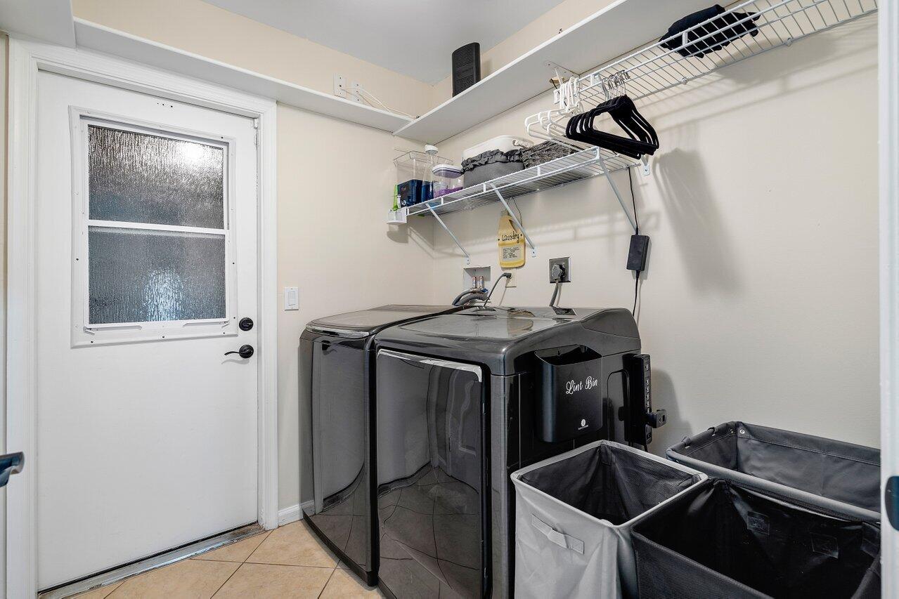 5515 Colbright Road Lake Worth, FL 33467 - Photo 58 of 58 laundry room off of the garage