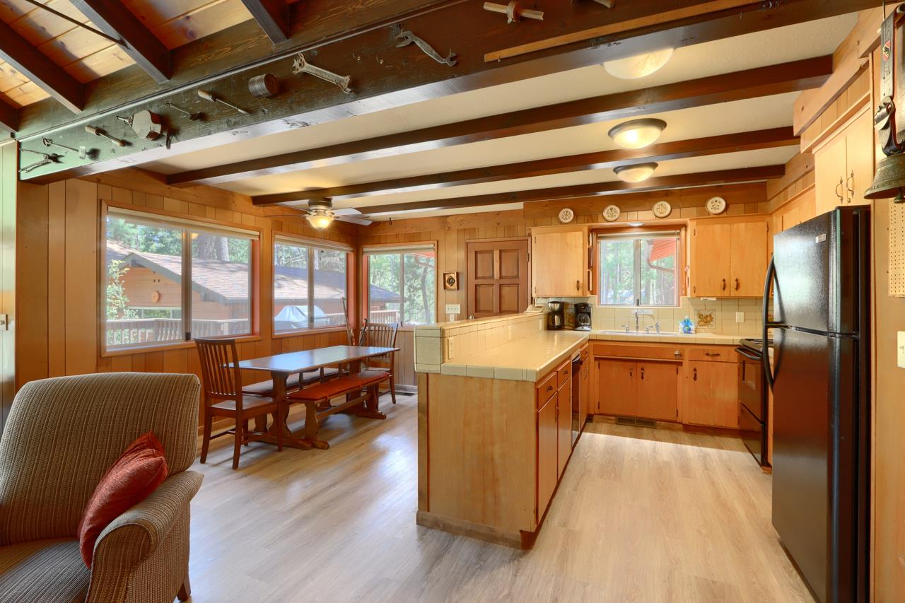 8067 Chilnualna Falls Road Wawona, CA 95389 - Photo 12 of 42 a kitchen with sink stove and refrigerator