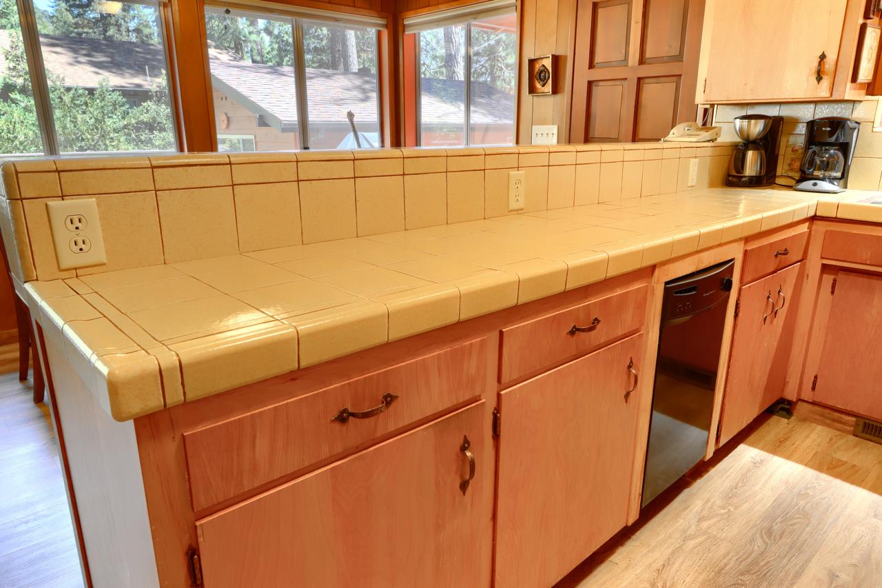 8067 Chilnualna Falls Road Wawona, CA 95389 - Photo 15 of 42 a utility room with dryer and washer