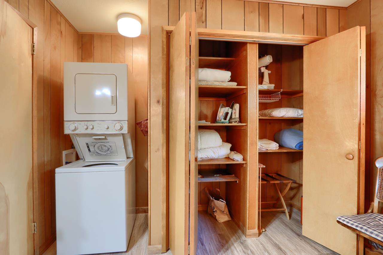 8067 Chilnualna Falls Road Wawona, CA 95389 - Photo 18 of 42 a view of walk in closet with clothes and shoes