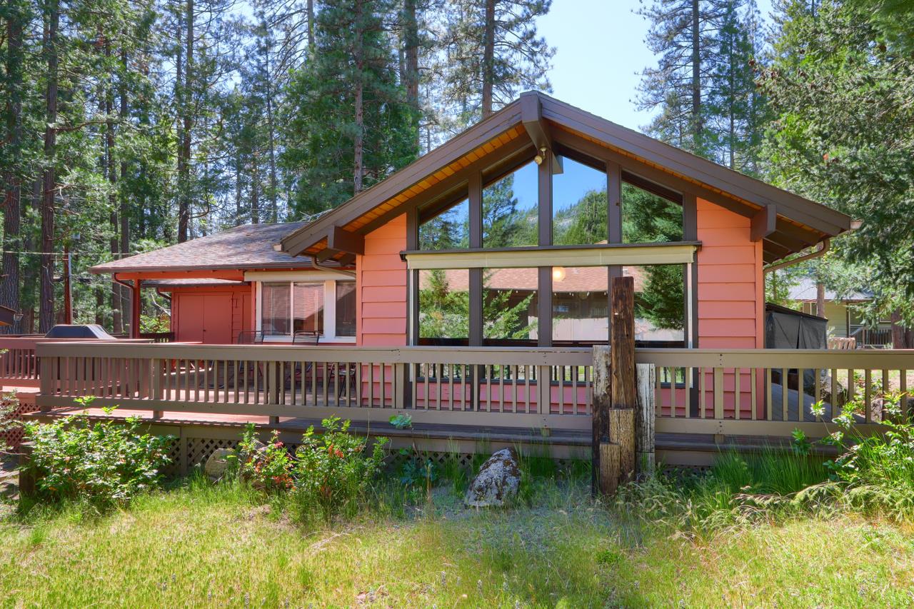 8067 Chilnualna Falls Road Wawona, CA 95389 - Photo 30 of 42 a front view of a house with garden