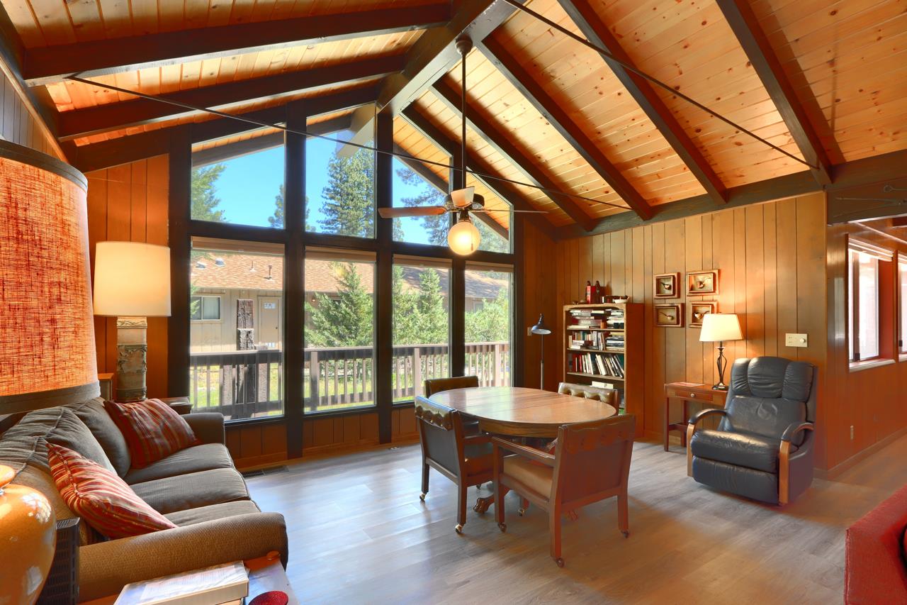 8067 Chilnualna Falls Road Wawona, CA 95389 - Photo 9 of 42 a living room with furniture and a large window
