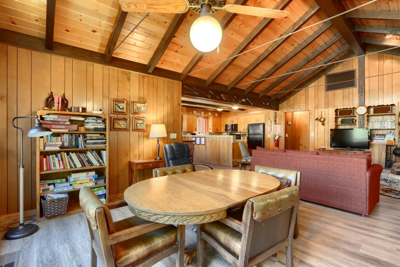 8067 Chilnualna Falls Road Wawona, CA 95389 - Photo 10 of 42 a dining room with furniture and wooden floor