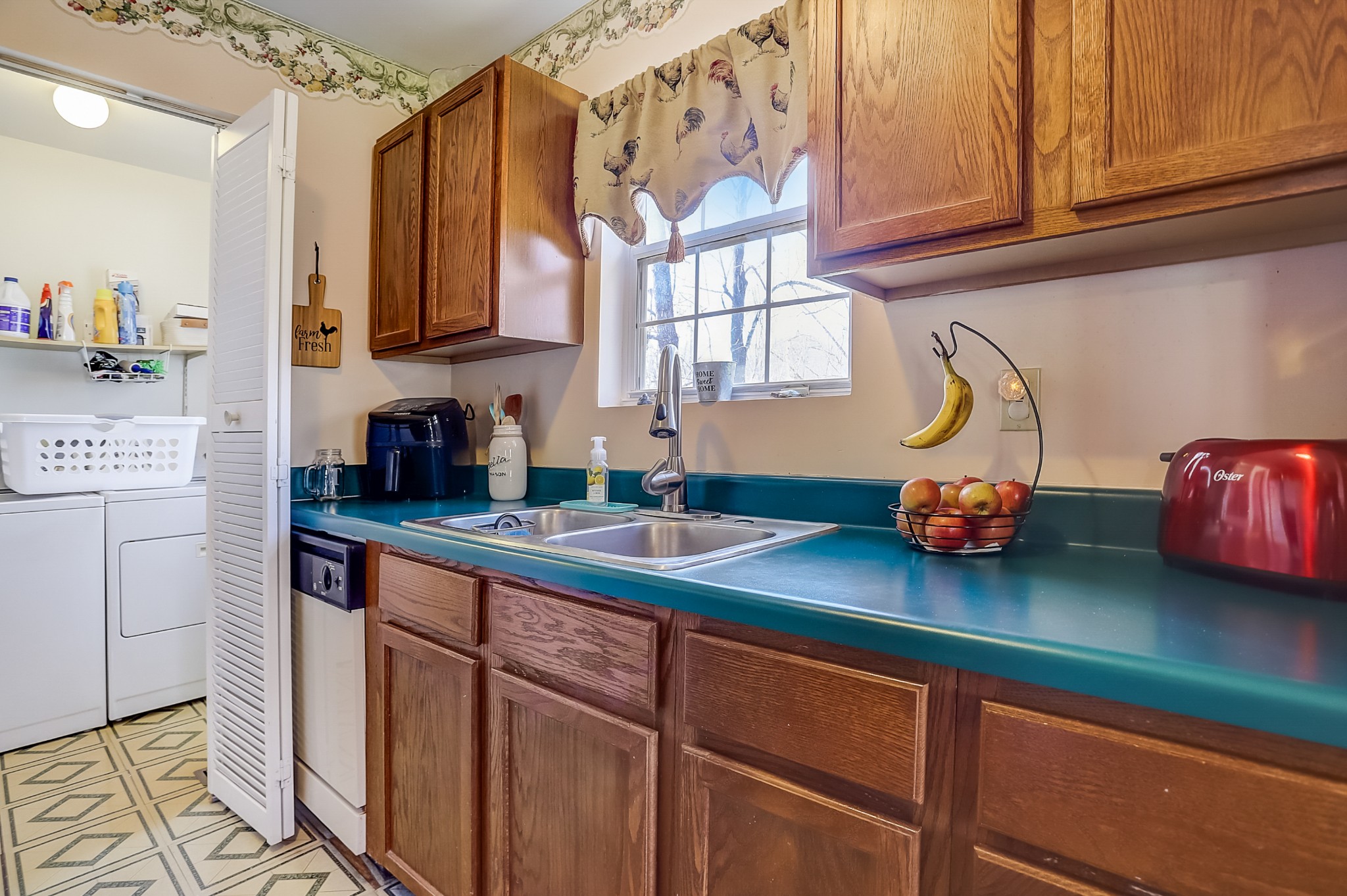 5535 Hargrove Ridge Road Franklin, TN 37064 - Photo 7 of 23 a kitchen with stainless steel appliances granite countertop a sink and cabinets