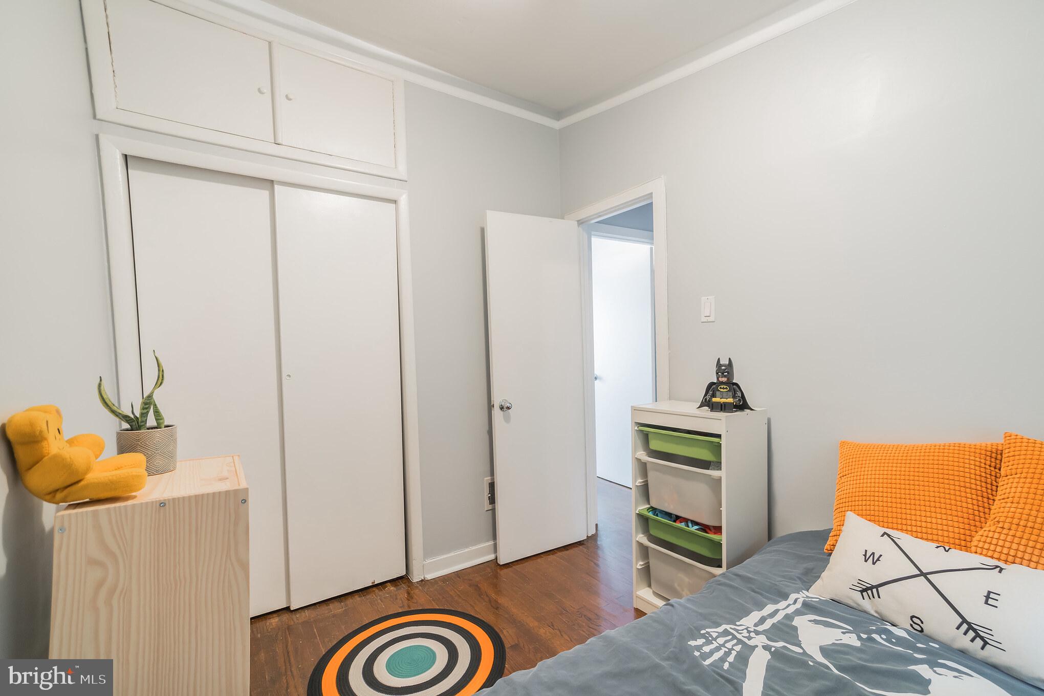 1032 Waverly Street Philadelphia, PA 19147 - Photo 23 of 30 a view of a bedroom with bed and furniture