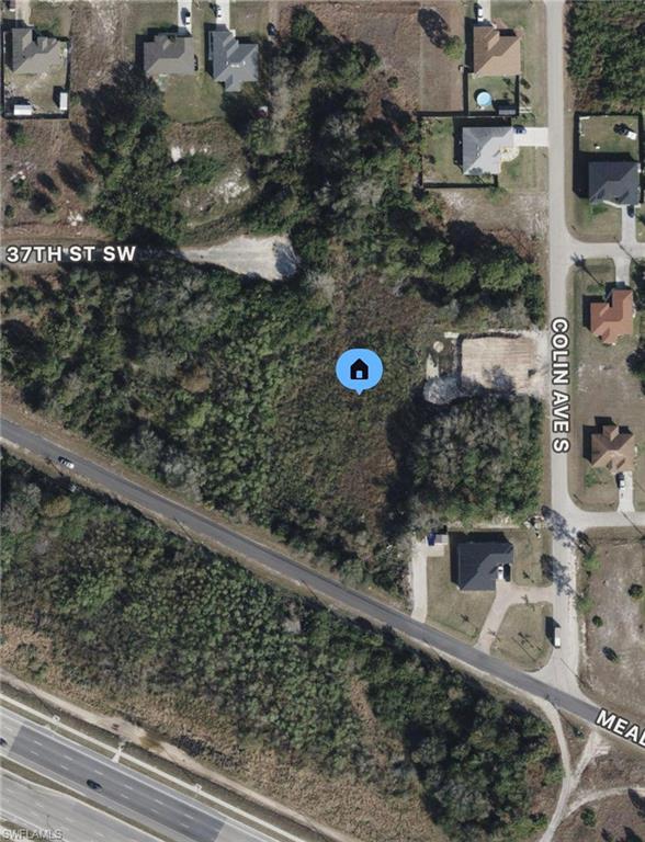 4003 37th Street Southwest Lehigh Acres, FL 33976 - Photo 1 of 1 a view of a wooden bridge