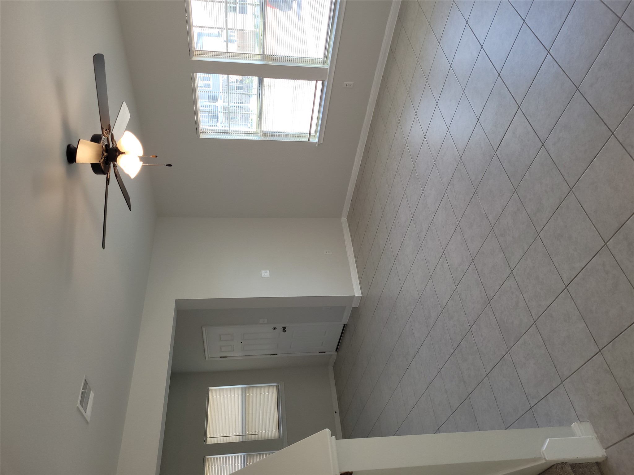 8308 Daisy Cutter Crossing Georgetown, TX 78626 - Photo 5 of 27 A versatile open-concept living space features neutral tones and durable tile flooring throughout.