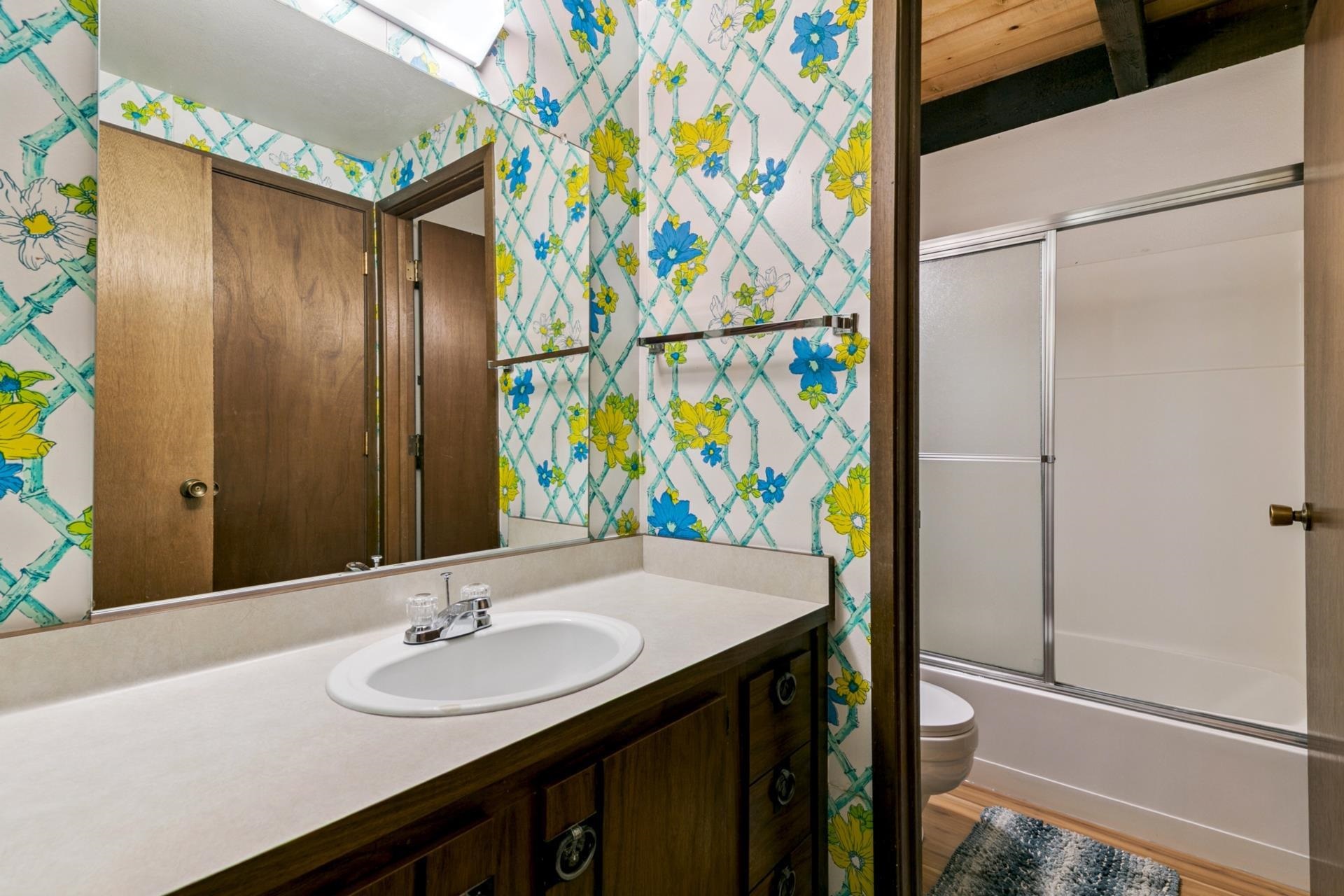 1001 Commonwealth Drive, Unit 114 Kings Beach, CA 96143 - Photo 15 of 23 a bathroom with a sink and a mirror