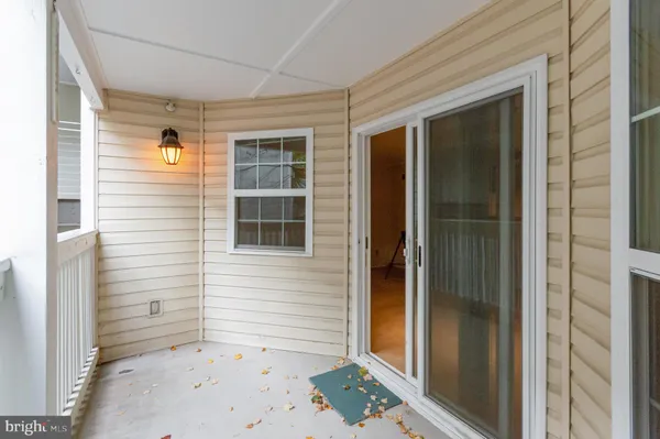 a view of a porch with a door