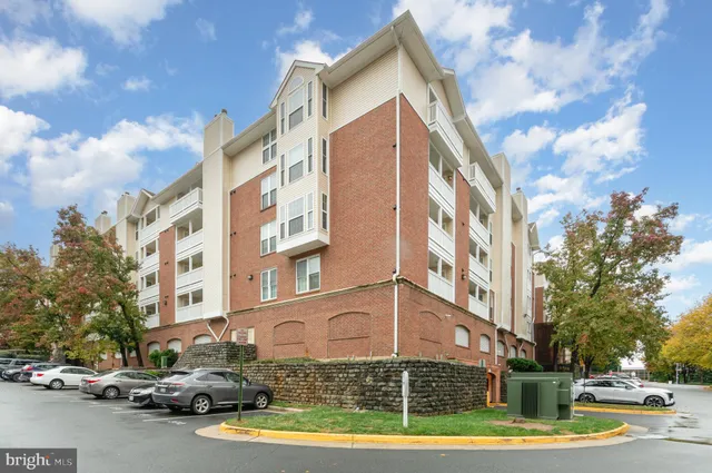 a view of a building with a street