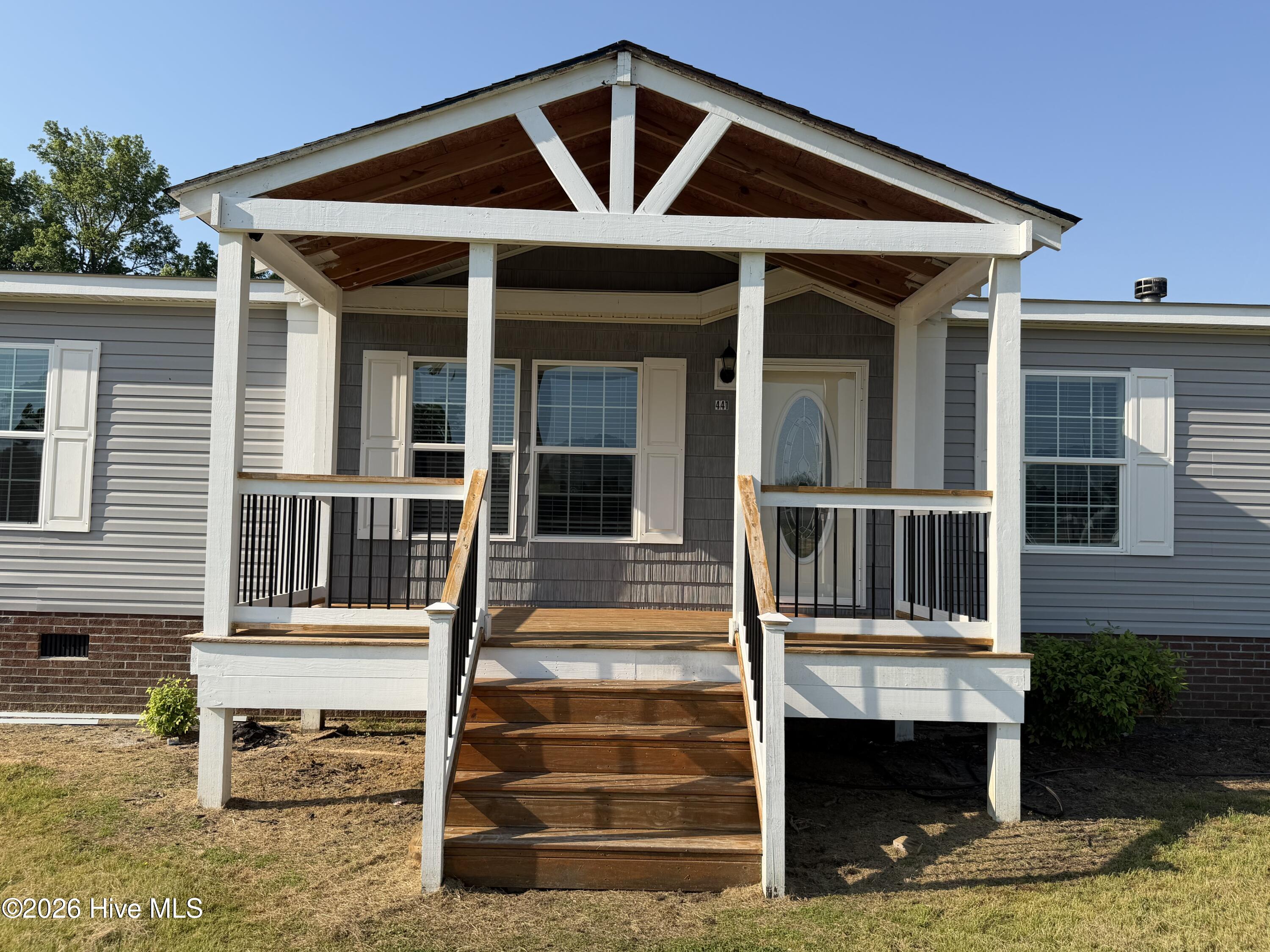 441 Mrs Tates Road Whiteville, NC 28472 - Photo 6 of 33 front deck