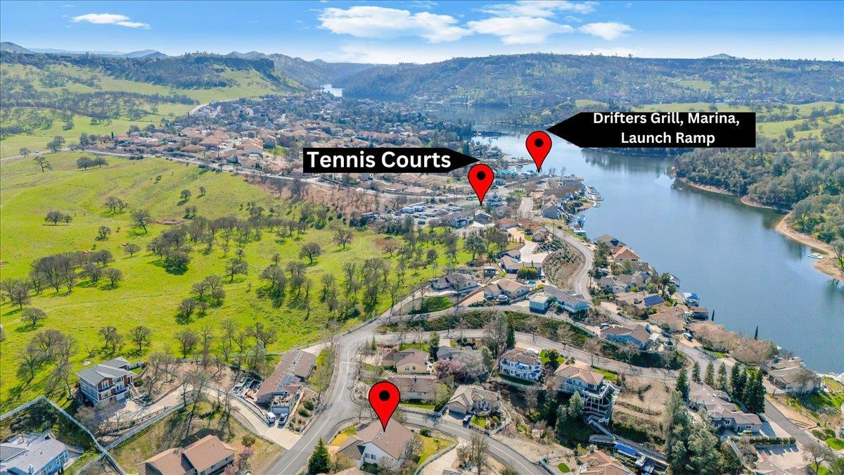 6250 Bluff View Road, Unit 60 Copperopolis, CA 95228 - Photo 2 of 75 an aerial view of swimming pool and mountain view