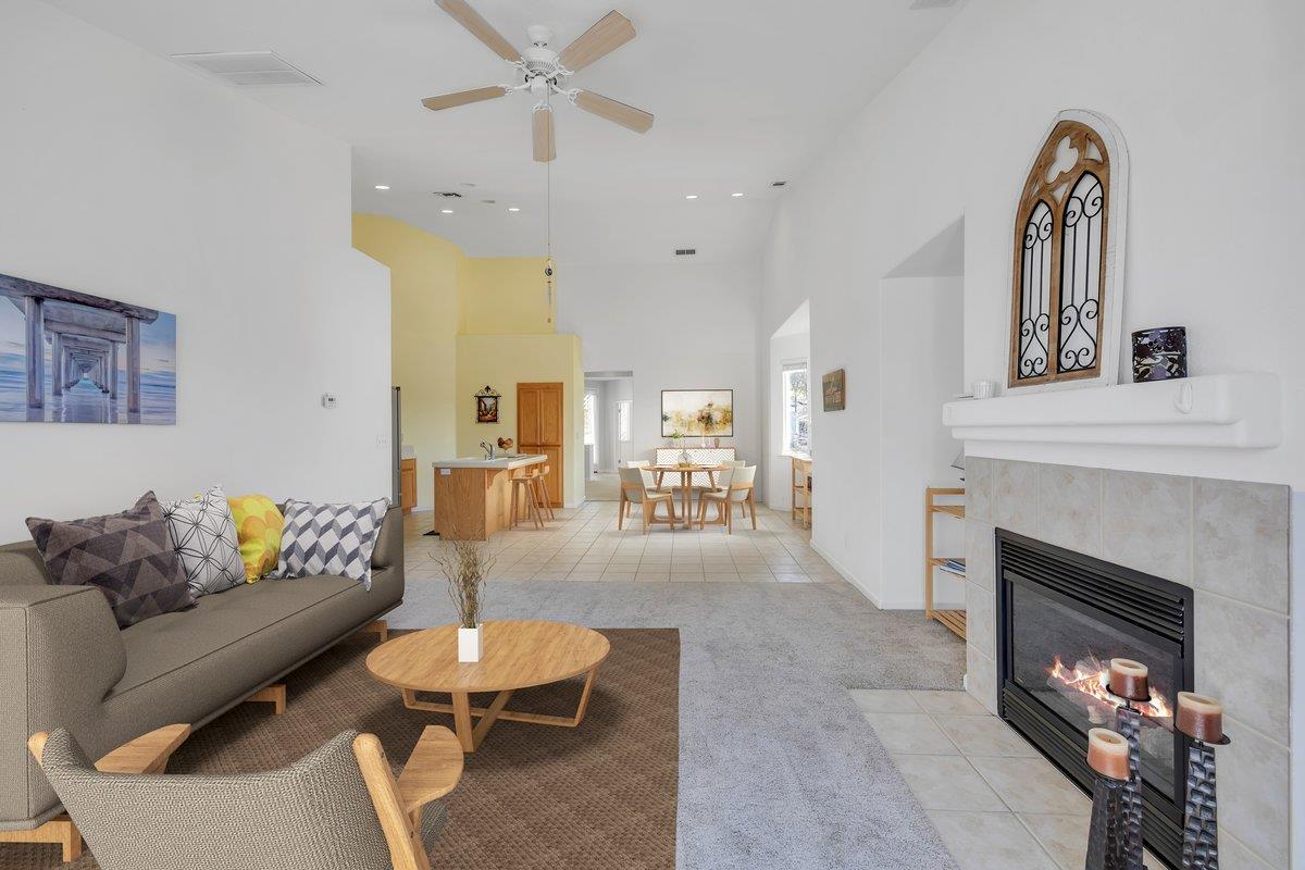 6250 Bluff View Road, Unit 60 Copperopolis, CA 95228 - Photo 23 of 75 a living room with furniture and a fireplace