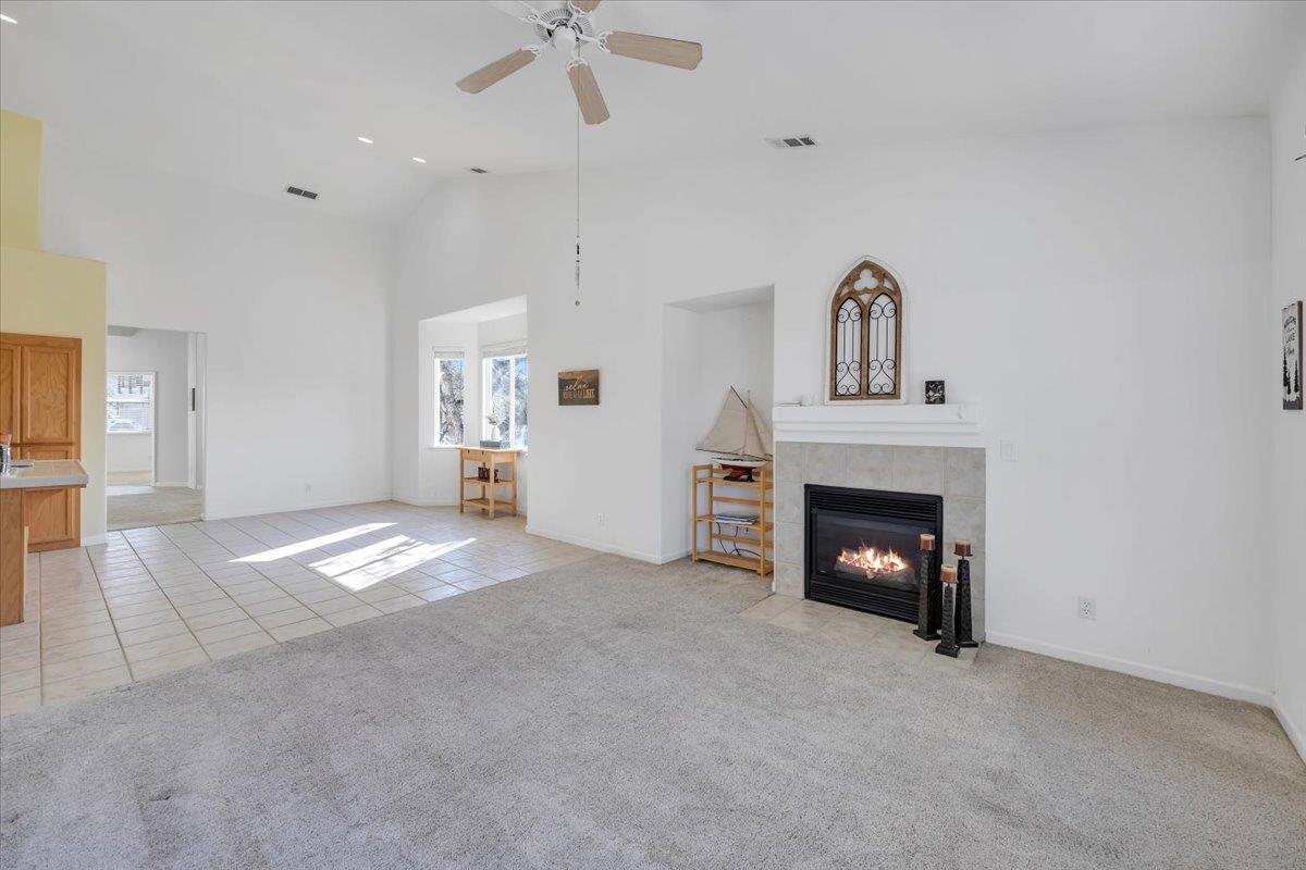 6250 Bluff View Road, Unit 60 Copperopolis, CA 95228 - Photo 24 of 75 a view of empty room with a fireplace and fan